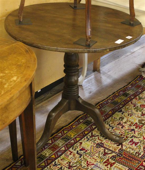 Circular mahogany tilt top table